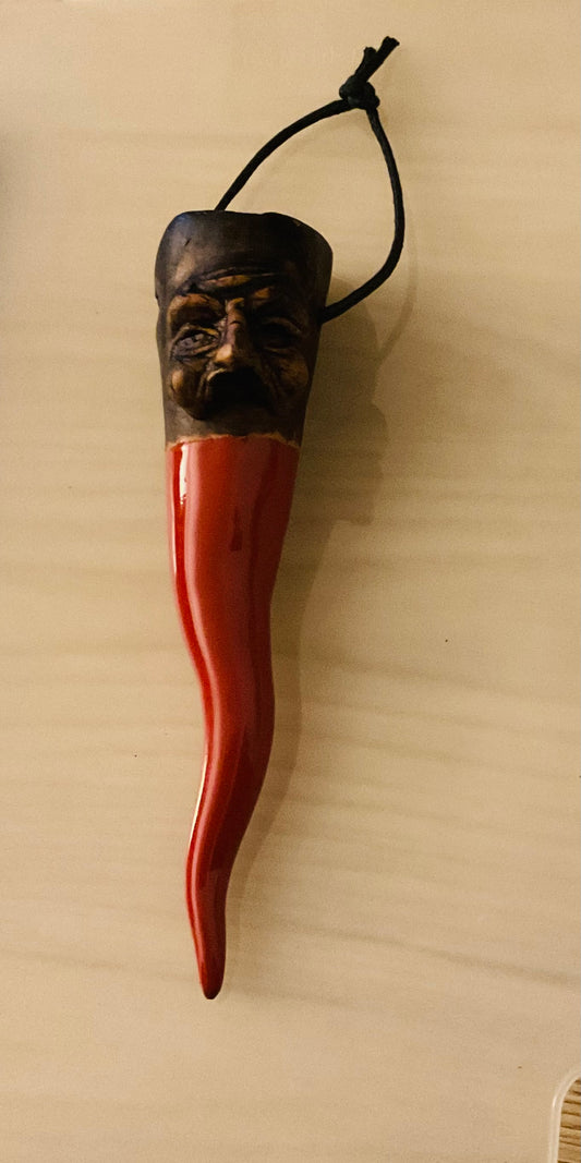Corno con maschera